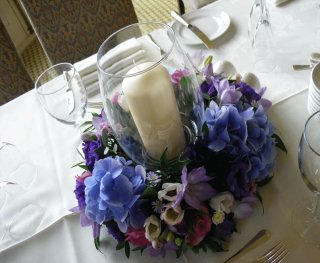 purple hydrangea, pink calla lily storm lantern table arrangement 