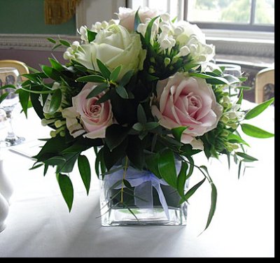 sweet avalanche rose low cube table arrangement 